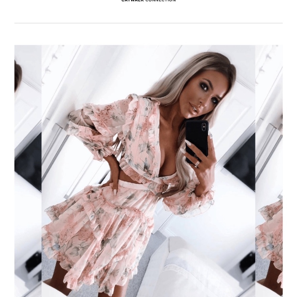 Beautiful cut out floral dress with tie back